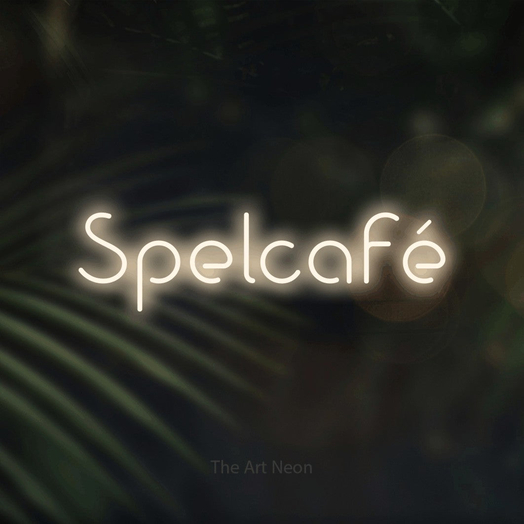 LED neon sign reading “Spelcafé”, arranged in a single line.
