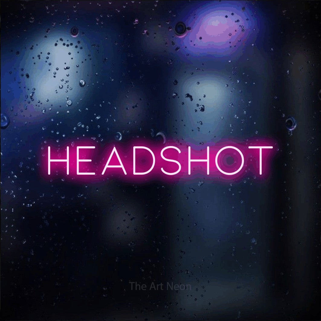 LED neon sign reading “HEADSHOT”, arranged in a single line.