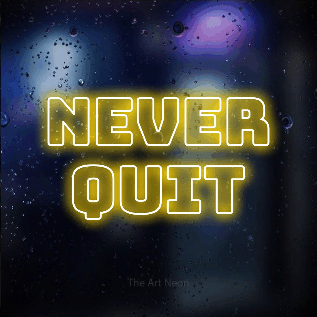 LED neon sign reading “Never Quit”, arranged in 2 lines.
