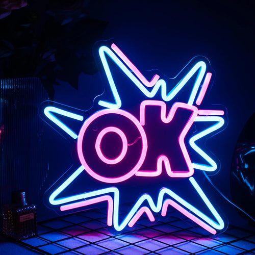 Bilden har en levande LED-neonskylt som visar ordet "OK" i ett djärvt, modernt teckensnitt.