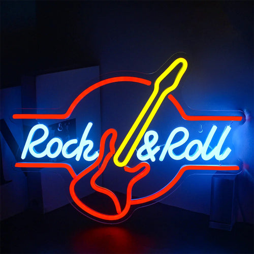 Bilden har en levande LED-neonskylt formad som en elgitarr, glödande med starka, färgglada ljus.