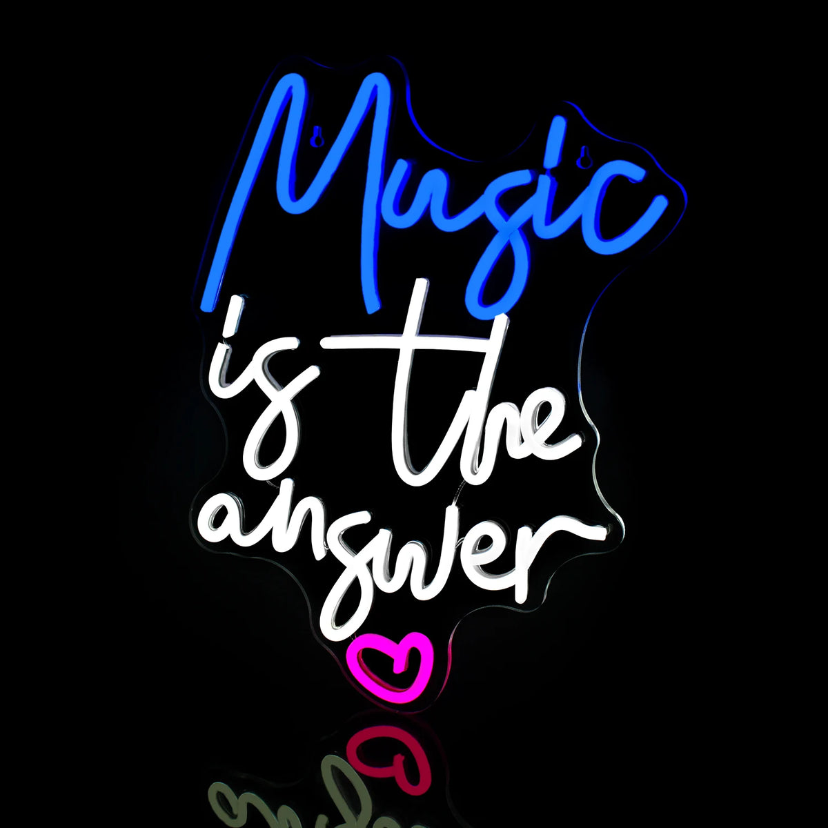 A vibrant LED neon sign glows with the phrase "Music is the Answer.