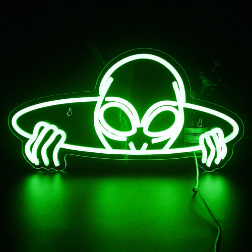 En levande LED-neonskylt formad som ett främmande huvud, med stora, mandelformade ögon.