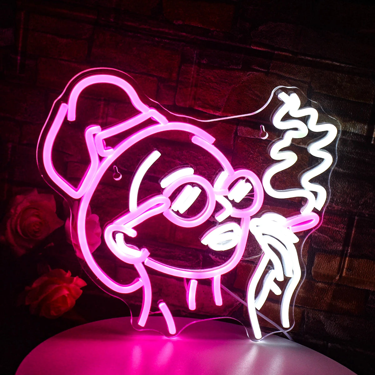 En levande LED-neonskylt som visar en stiliserad illustration av en flicka som röker.