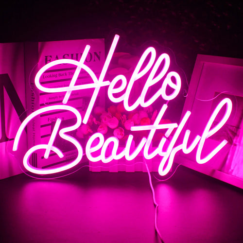 En levande LED-neonskylt som visar orden "Hello Beautiful" i ett graciöst, flytande manus.