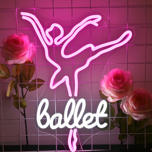 En levande och färgstark LED-neonskylt som visar ordet "Dancing" i ett stilfullt, kursivt teckensnitt.