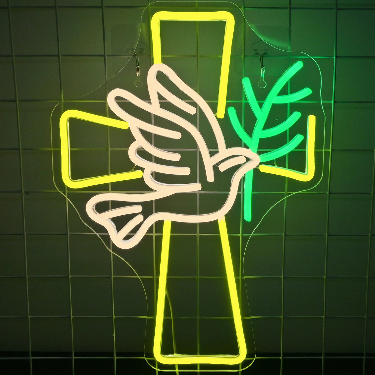 Bilden har en handgjord LED-neonskylt som på ett intrikat sätt kombinerar två symboliska element: ett kors och en duva.