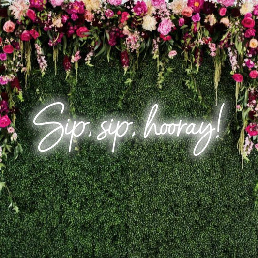 Unique custom LED neon sign with the phrase Sip, Sip, Hooray! in bright, playful typography. Perfect for celebratory occasions.