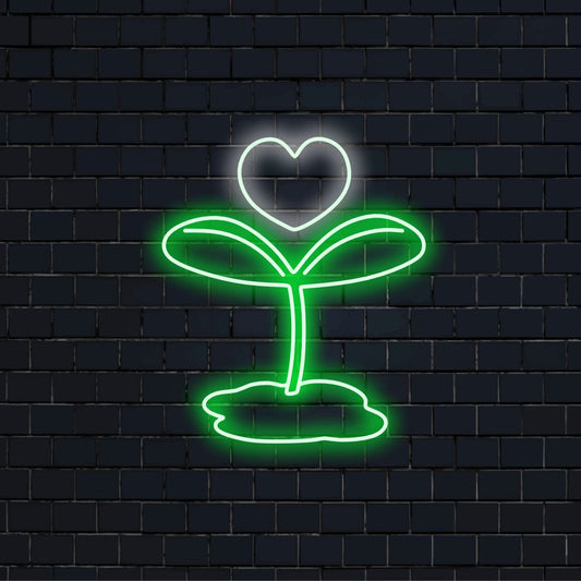 "Sprout and Heart Neon Sign" förenar naturens friskhet med innerlig värme, och kastar ett strålande sken för en atmosfär av tillväxt och kärlek i ditt utrymme.