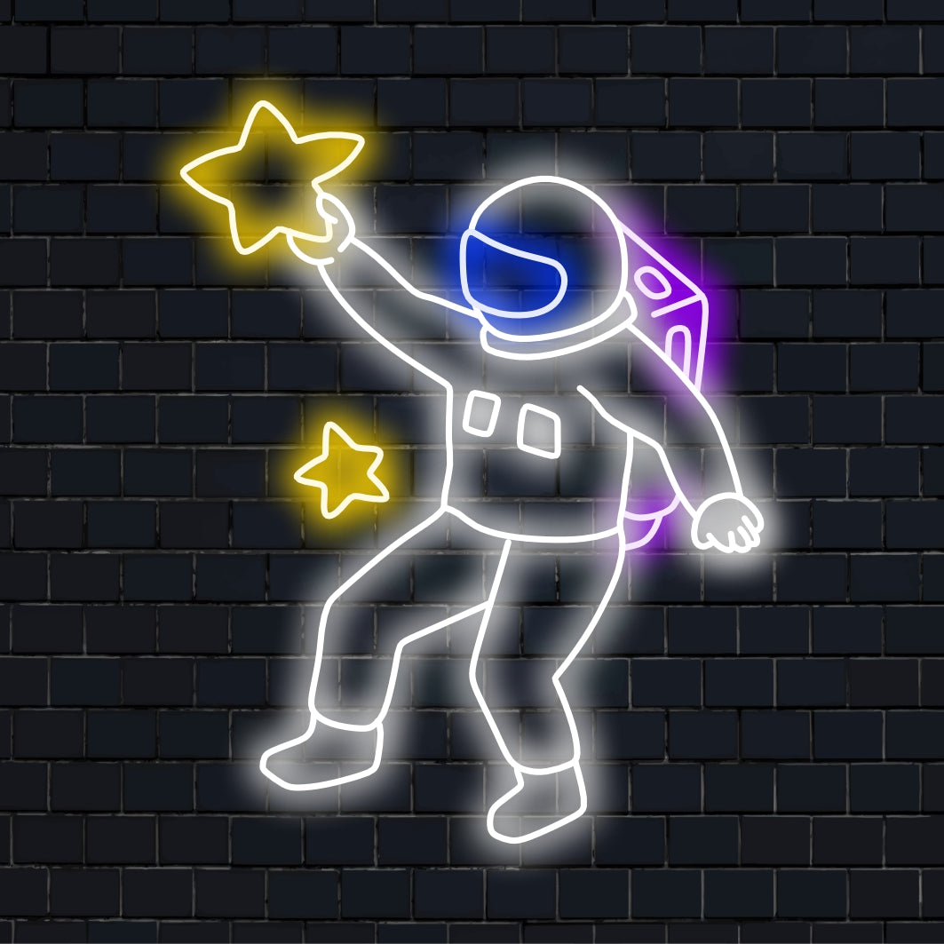 En upplyst neonskylt med en astronaut som håller en stjärna, som symboliserar utforskningen och undret i rymden