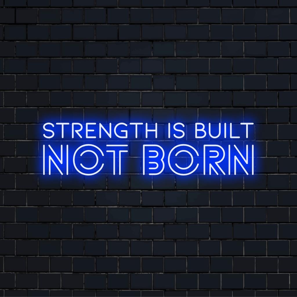 Vibrant custom LED neon sign depicting Strength Is Built Not Born, perfect motivation wall art for personal spaces.