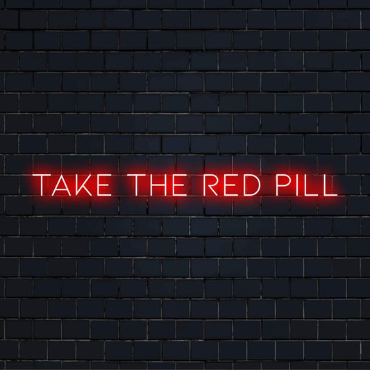 LED-neonskylt som visar frasen Take The Red Pill i livfullt, iögonfallande ljus. Perfekt för modern väggdekoration.