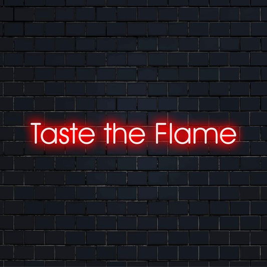 Levande specialgjorda LED-neonskyltar som läser Taste The Flame utstrålar eldig energi, perfekt för dynamiska utrymmen.