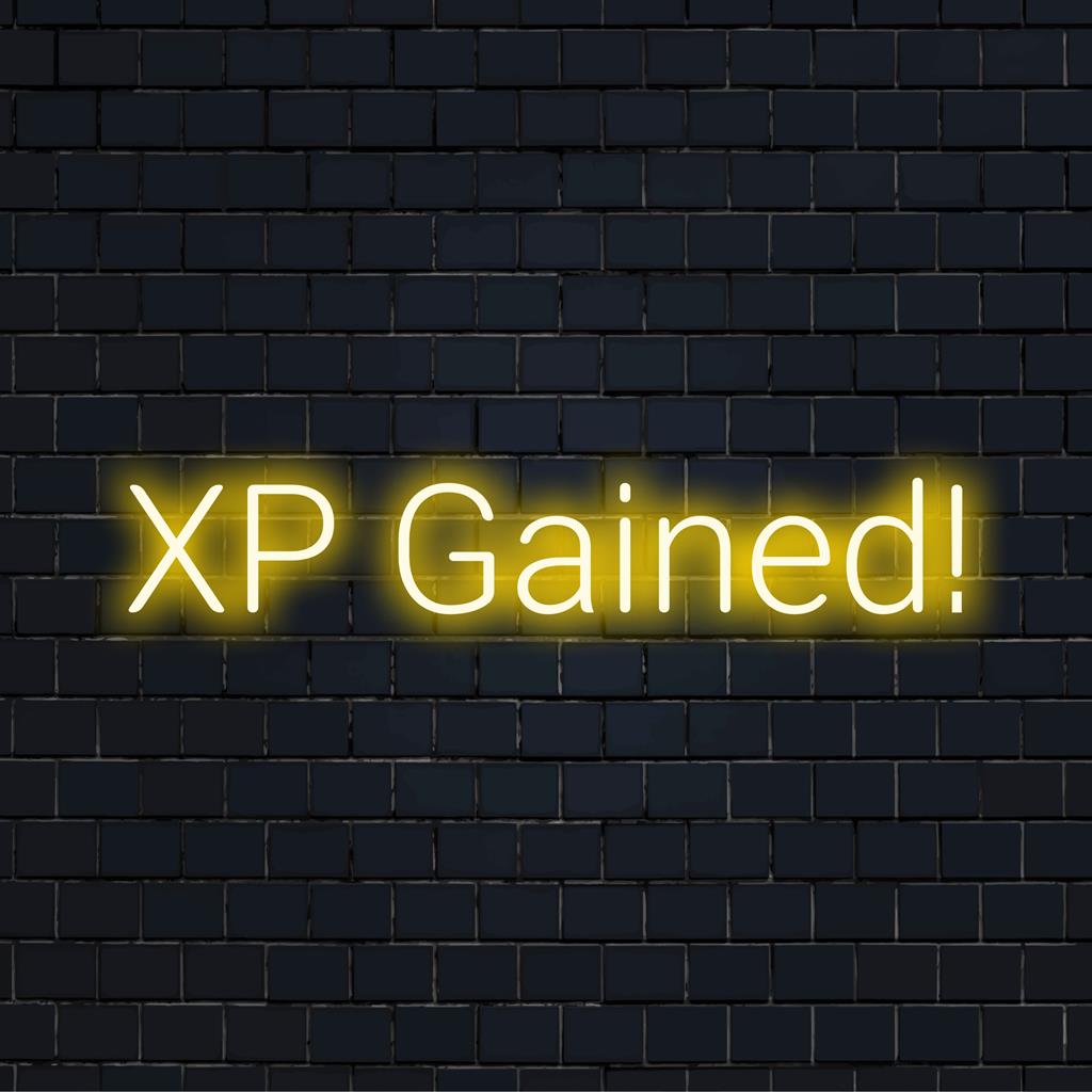 Anpassad LED neonskylt läsning XP Gained! i livfulla färger; perfekt inredning för gamerutrymmen och moderna interiörer.