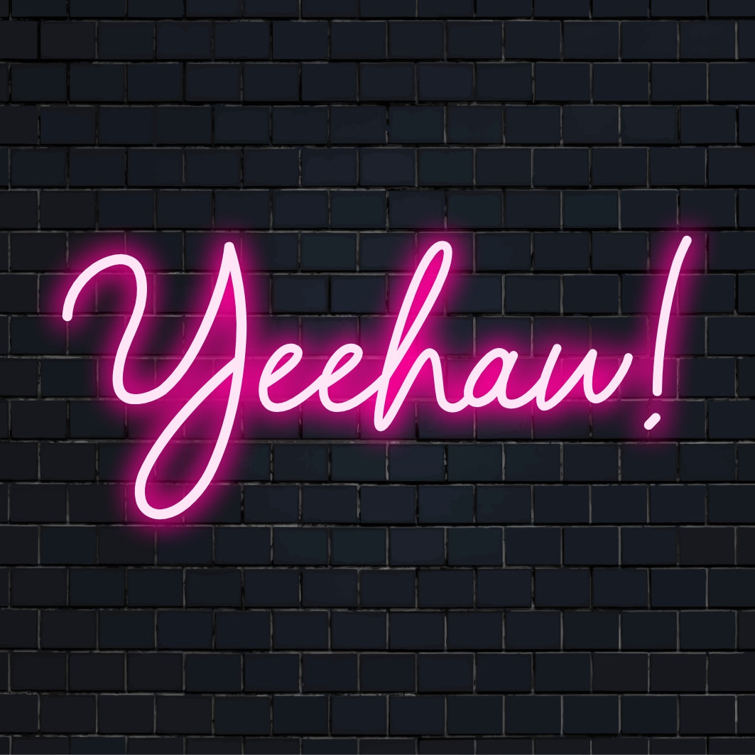 Ljusa och livfulla Yeehaw LED neonskylt, en perfekt handgjord utlåtande pjäs för unik inredning eller festliga miljöer.