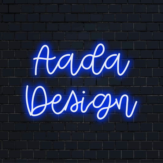 Aada Design Personalized Neon Light with glowing lettering against brick backdrop