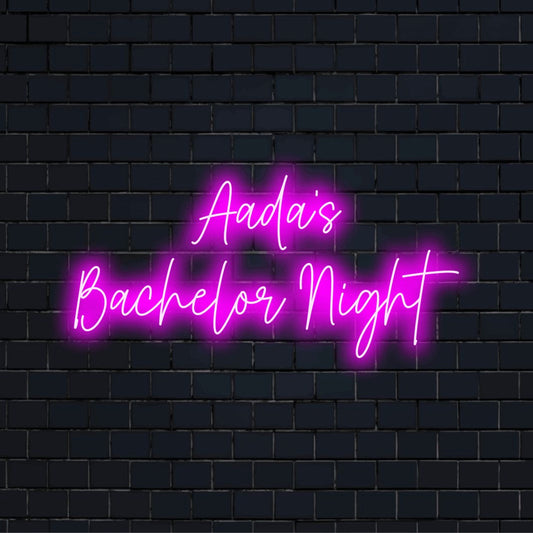 Aada_s Bachelor Night Custom Name Neon Sign, bright neon lettering against black brick wall