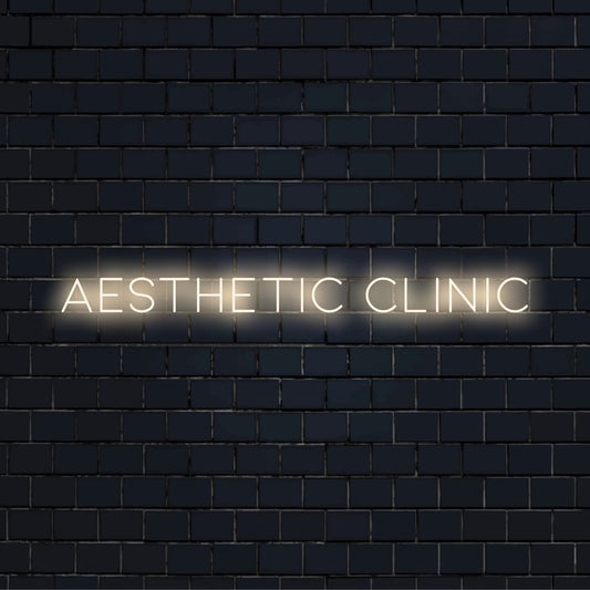 Aesthetic Clinic Neon Sign, bright neon glow on dark brick background