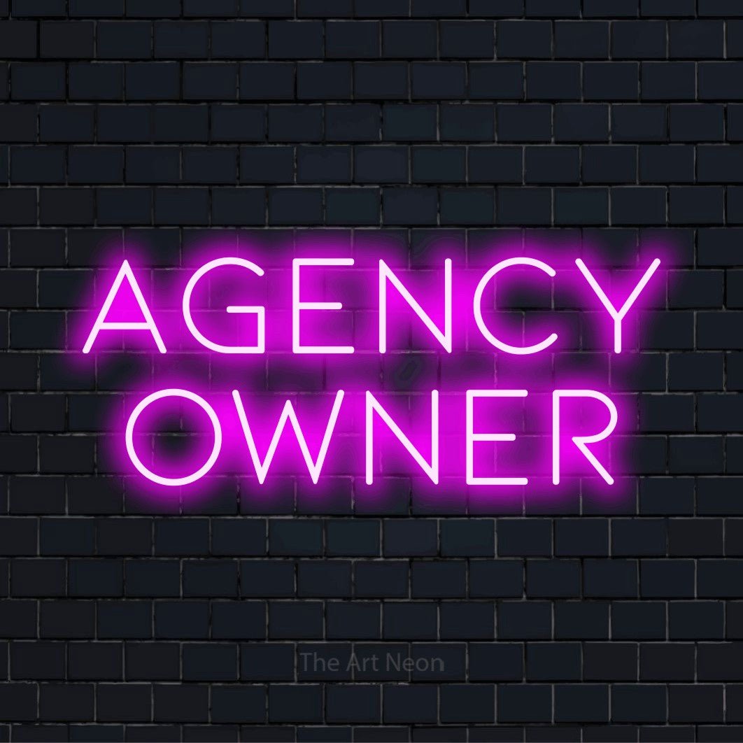 "Agency Owner" glowing LED neon sign on a black brick wall