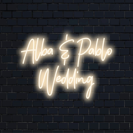 Alba _ Pablo Wedding Personalized LED Neon Sign, glowing neon text on dark brick background