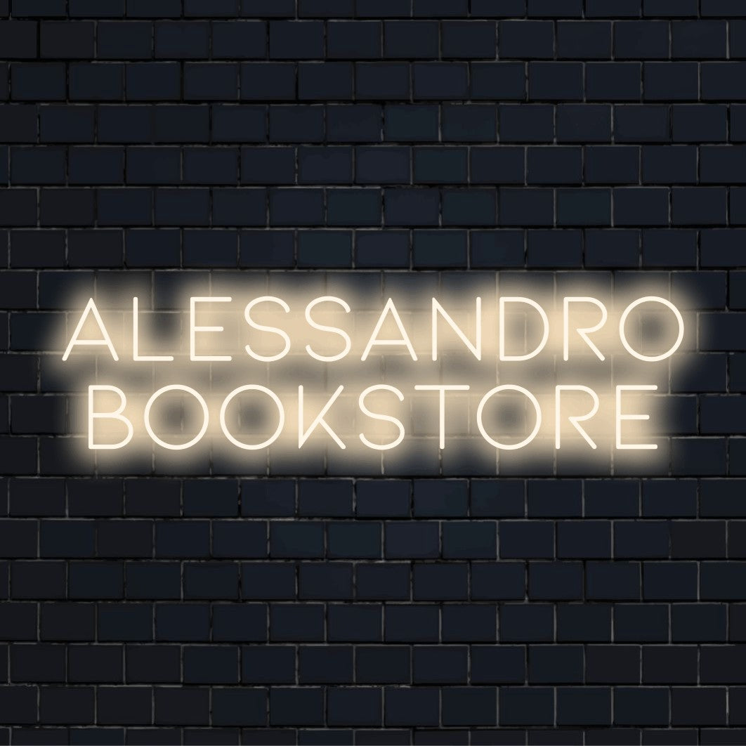 Alessandro Bookstore Personalized LED Neon Sign, glowing wall decor against brick backdrop