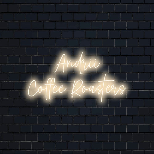 Andrii Coffee Roasters Custom Name Neon Sign, soft neon glow on dark brick background