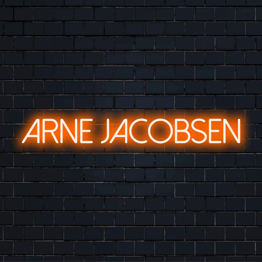 Arne Jacobsen Neon Light with glowing neon text against black brick wall