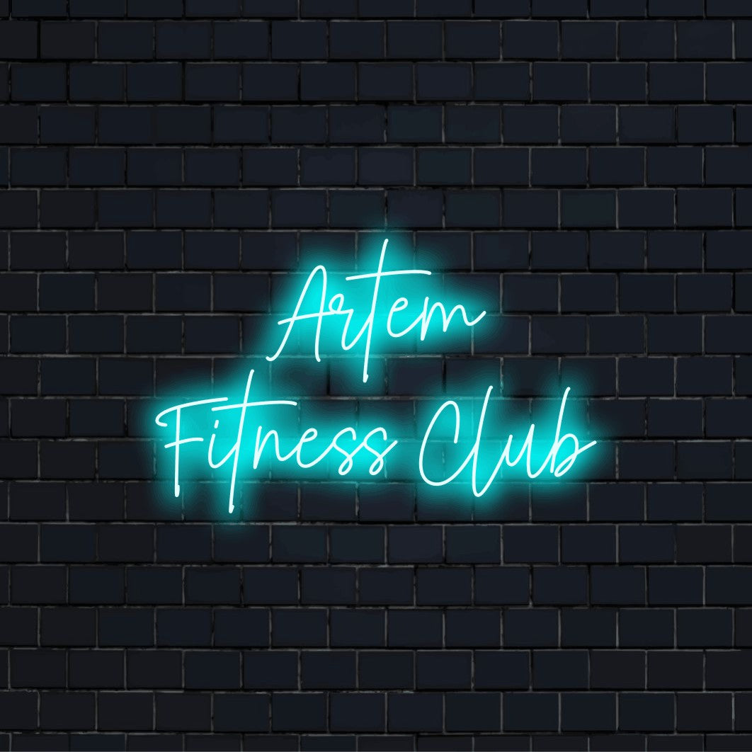 Artem Fitness Club Personalized LED Neon Sign, glowing lettering against black brick wall