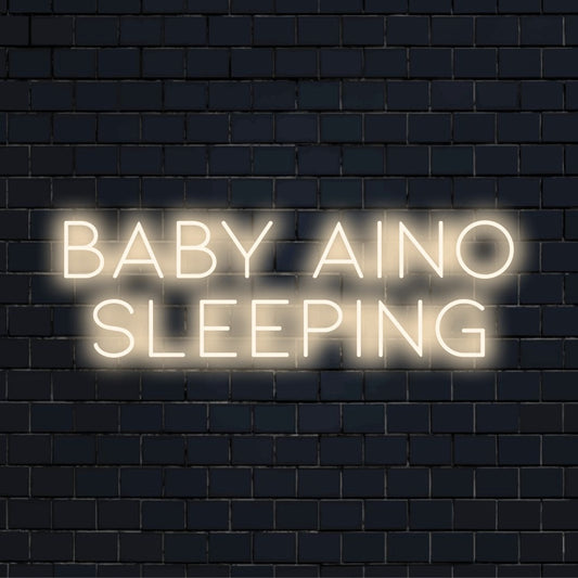 Baby Aino Sleeping Personalized LED Neon Sign, soft neon glow against brick backdrop