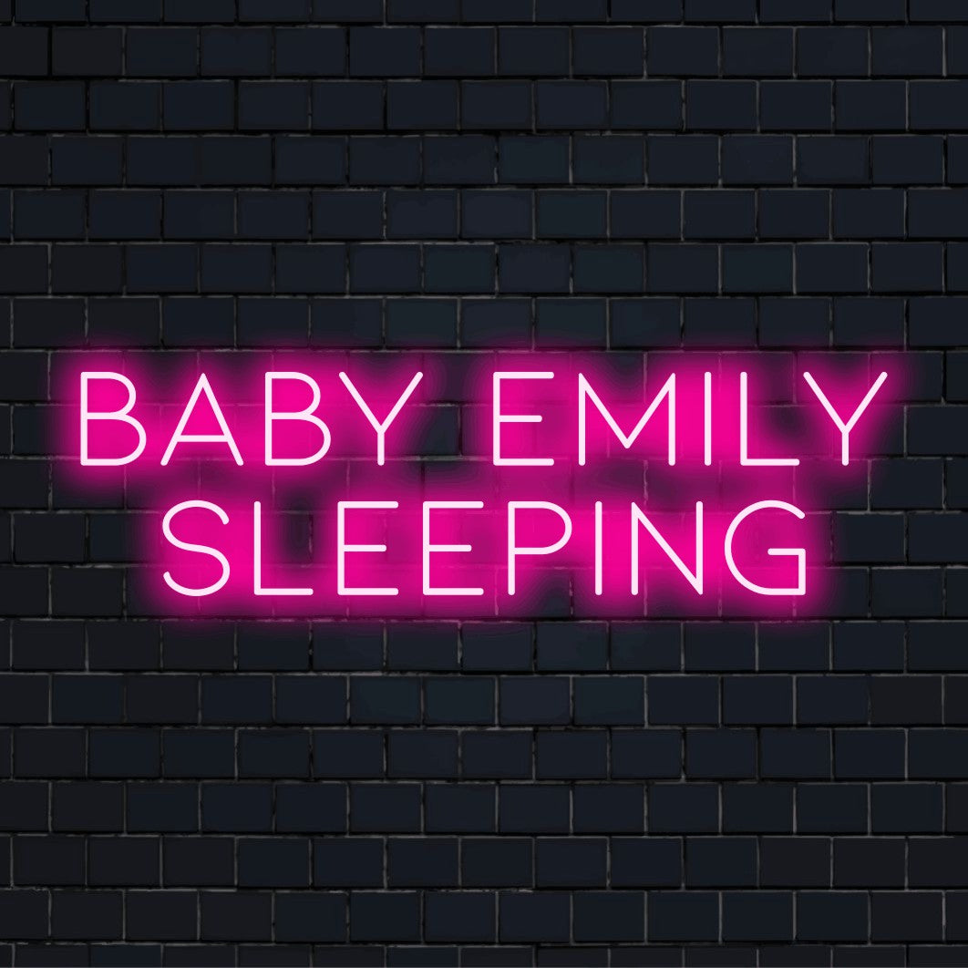 Baby Emily Sleeping Custom Name Neon Sign, soft neon glow on dark brick background