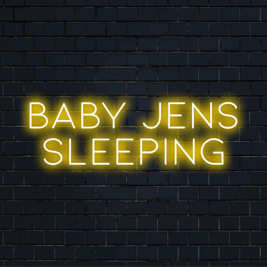 Baby Jens Sleeping Personalized LED Neon Sign, neon text light on dark brick background