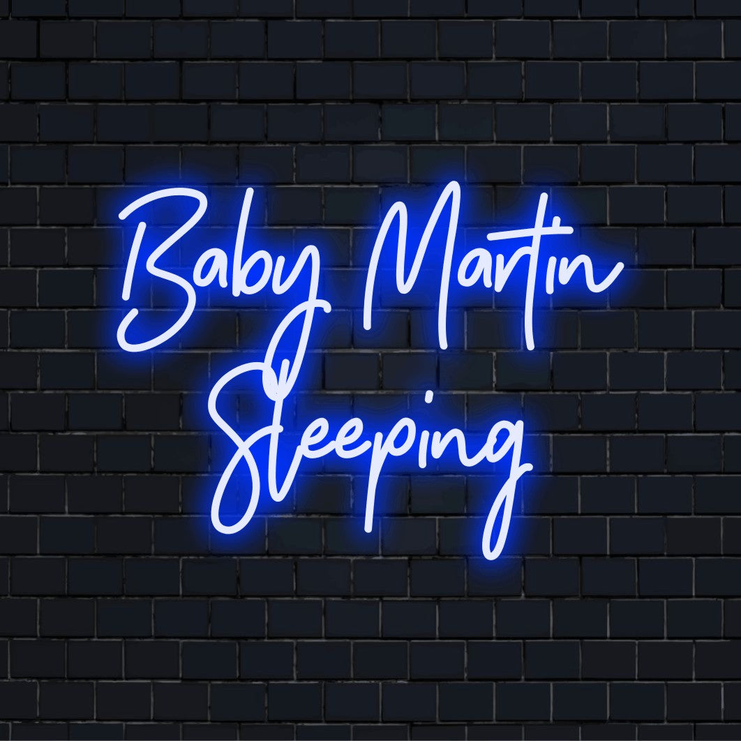 Baby Martin Sleeping Personalized LED Neon Sign, soft neon glow against brick backdrop