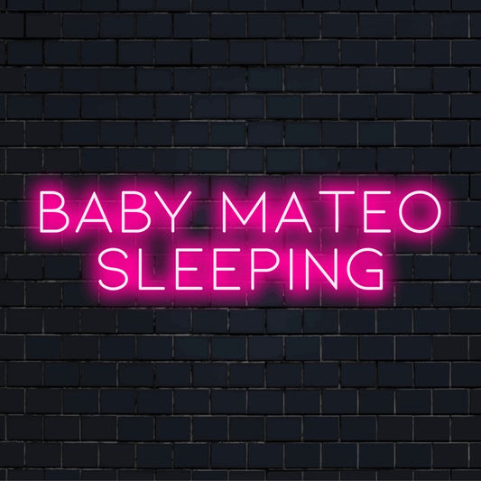 Baby Mateo Sleeping Personalized LED Neon Sign, bright neon glow on dark brick background