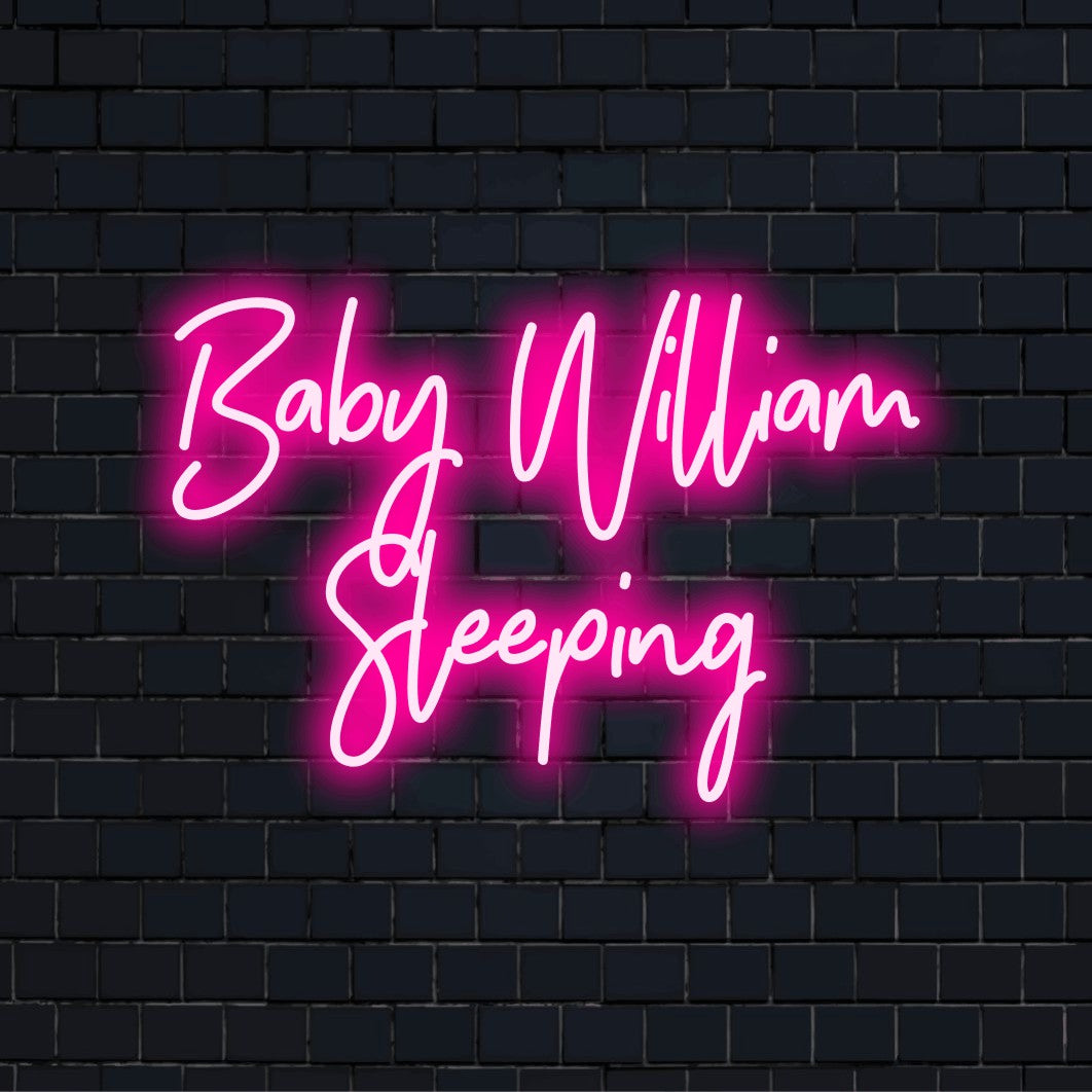 Baby William Sleeping Custom Name Neon Sign, neon text light on black brick background