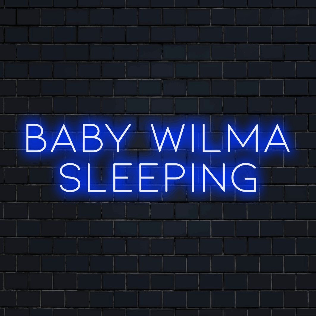 Baby Wilma Sleeping Personalized LED Neon Sign, glowing neon text on dark brick background