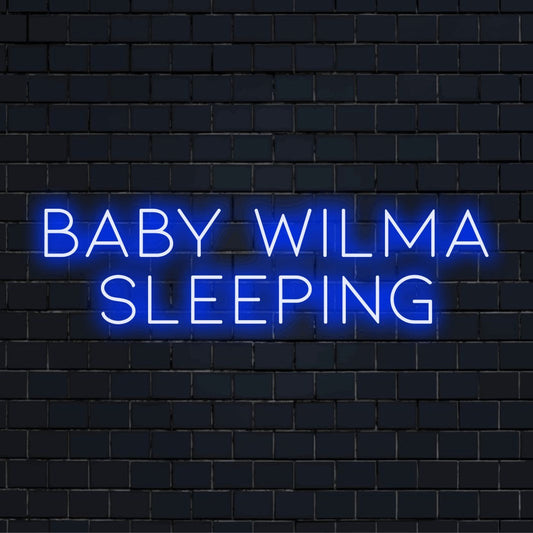 Baby Wilma Sleeping Personalized LED Neon Sign, glowing neon text on dark brick background