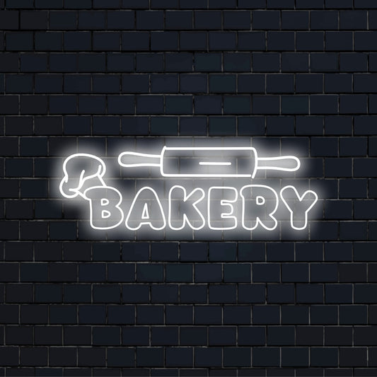Bakery Rolling Pin Neon Sign, glowing neon text on dark brick wall