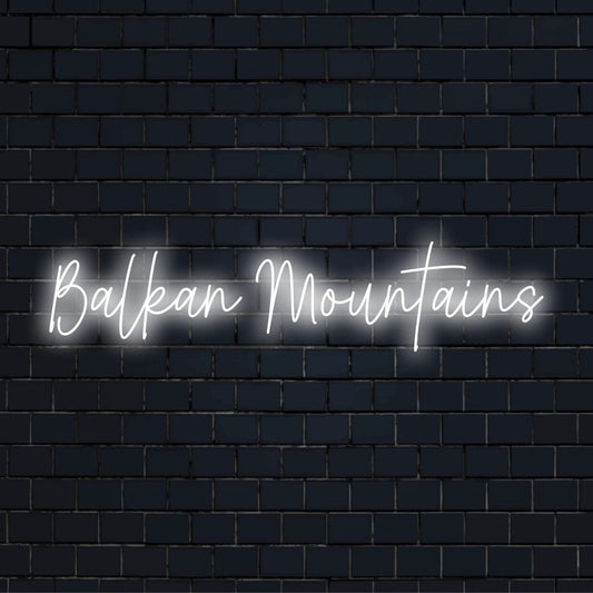 Balkan Mountains Neon Sign, bright neon lettering on dark brick wall