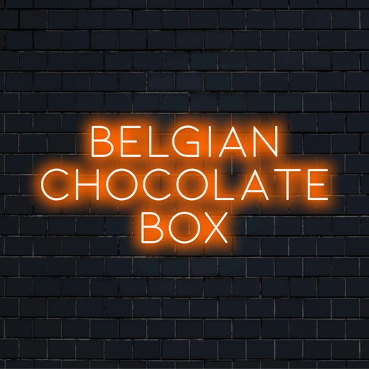 Belgian Chocolate Box Neon Sign, bright neon glow against brick backdrop