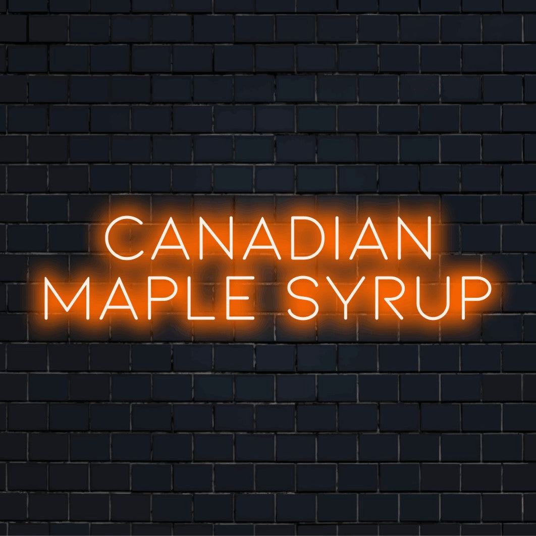 Canadian Maple Syrup Neon Sign, neon text light on black brick background