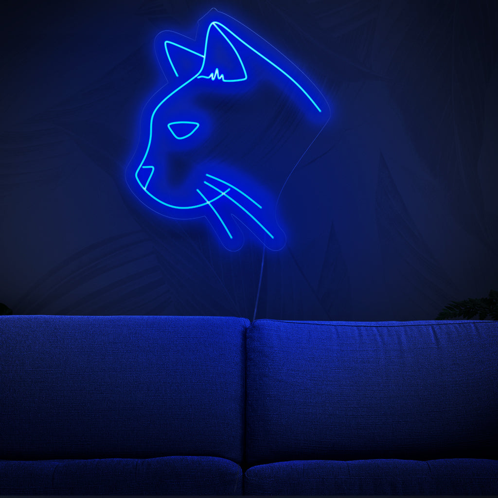 En charmig katt neonskylt, perfekt för inredning med djurtema, som utstrålar ett levande och fängslande ljus.