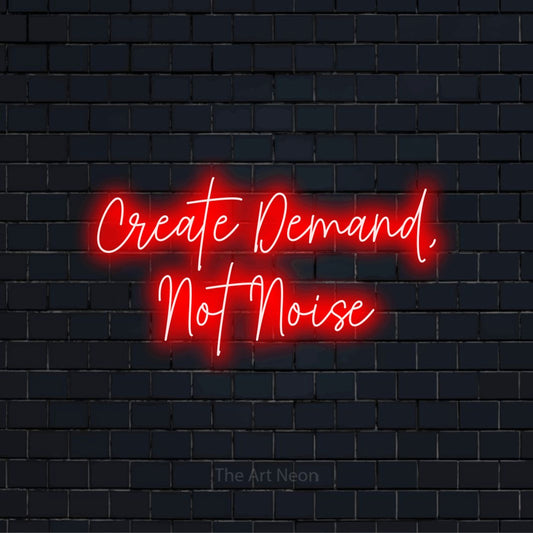 "Create Demand, Not Noise" neon text design on a black brick wall