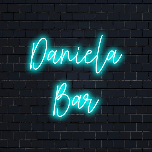 Daniela Bar Personalized LED Neon Sign, glowing neon text on dark brick wall
