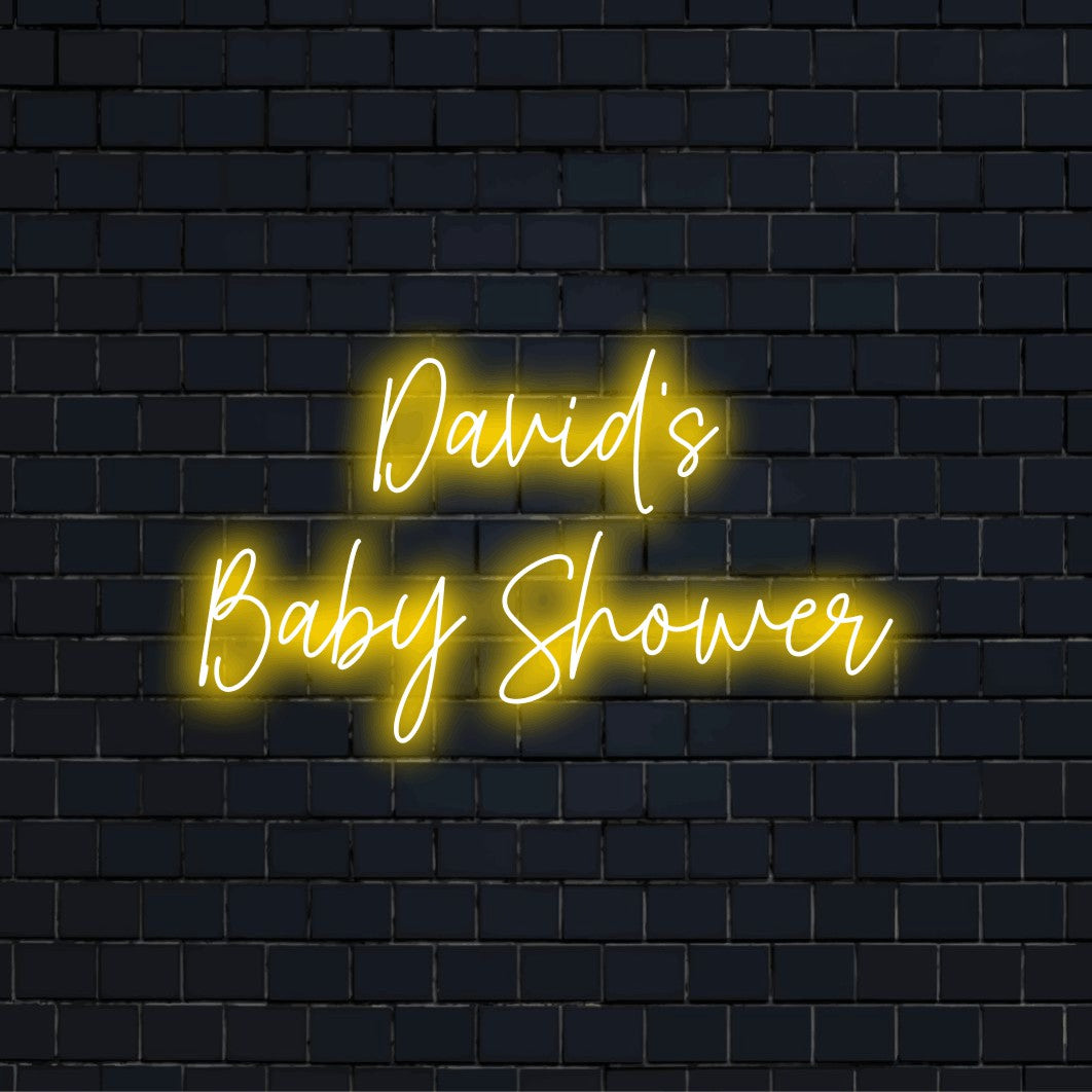 David_s Baby Shower Personalized LED Neon Sign, bright LED glow on dark brick wall
