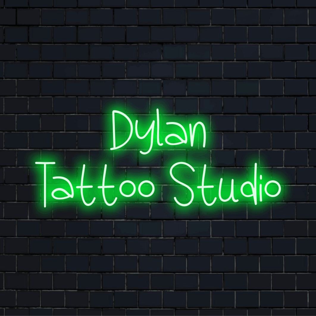 Dylan Tattoo Studio Personalized LED Neon Sign, neon text light on dark brick background
