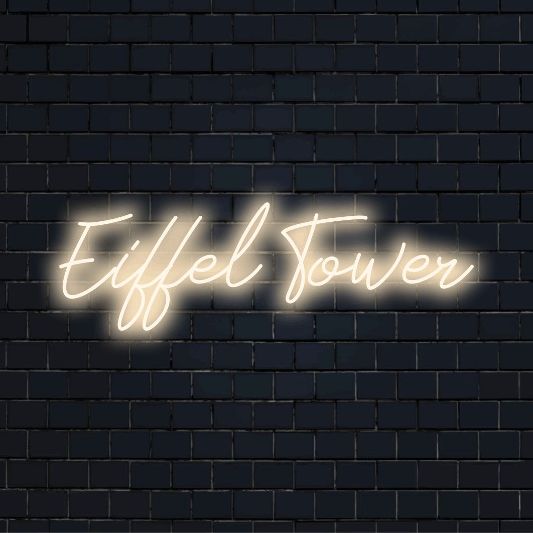 Eiffel Tower LED Neon Sign, glowing neon text on black brick background