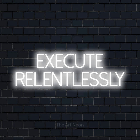 "Execute Relentlessly" neon text design on a black brick wall