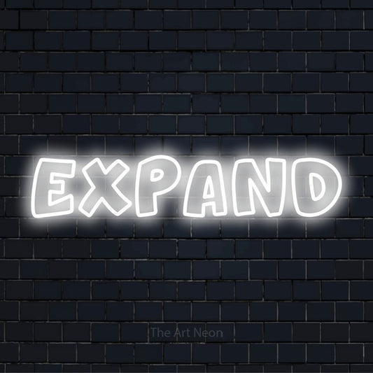 "Expand" text design with neon effect on a black brick wall