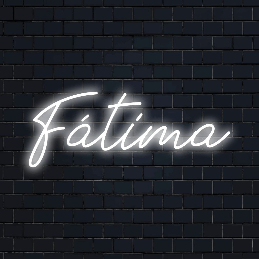 F Tima Neon Sign, glowing wall decor against brick backdrop