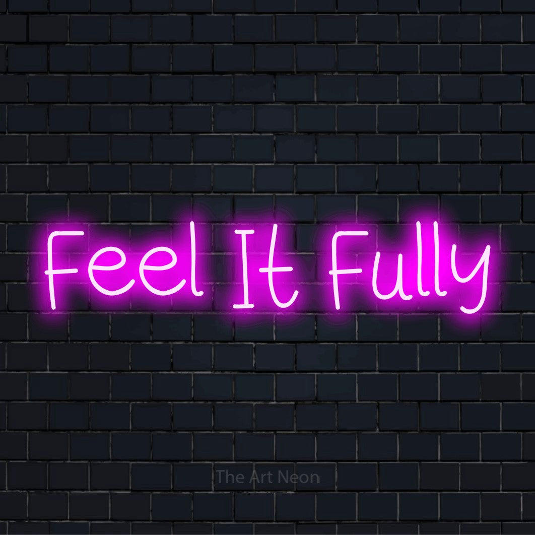 "Feel It Fully" neon text design on a black brick wall